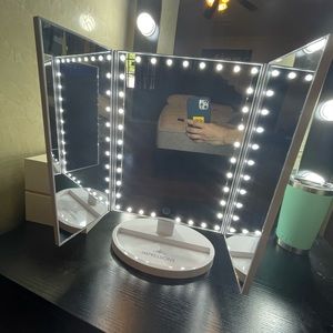 Large Impressions Vanity Malik Mirror